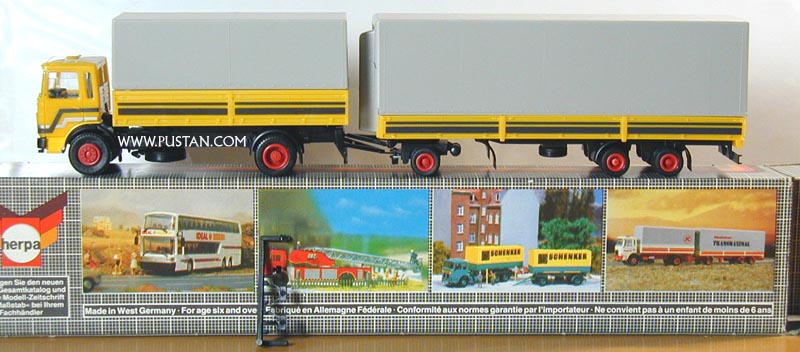 Kässbohrer Transmaximal M•A•N gelb mit Streifendesign Transmaximal